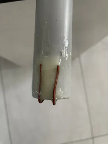 Photo of the new AWD tube with anodized aluminum wires inside the PVC tube